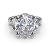 Three Stone Oval and Cadillac Engagement Ring