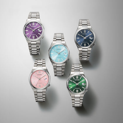 pink dial citizen automatic watch on wrist