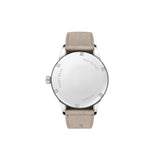 Watch with a beige strap and silver case on a white background