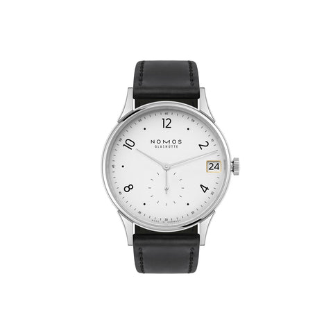 Nomos watch with black strap and white face on a white background