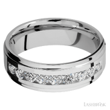 7 mm wide/Flat Grooved Edges/Cobalt Chrome band with an  arrangement of 9, .1 carat Round Diamond stones in a Channel setting.
