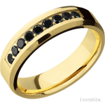 6 mm wide/Beveled/14K Yellow Gold band with an  arrangement of 9, .05 carat Round Black Diamond stones in a Bead Channel setting.