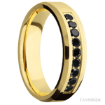 6 mm wide/Beveled/14K Yellow Gold band with an  arrangement of 9, .05 carat Round Black Diamond stones in a Bead Channel setting.