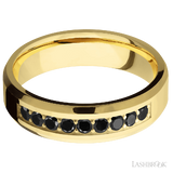 6 mm wide/Beveled/14K Yellow Gold band with an  arrangement of 9, .05 carat Round Black Diamond stones in a Bead Channel setting.