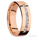 7 mm wide/Flat/14K Rose Gold band with an  arrangement of 9, .05 carat Round Diamond stones in a Channel setting.