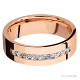 7 mm wide/Flat/14K Rose Gold band with an  arrangement of 9, .05 carat Round Diamond stones in a Channel setting.