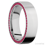 7 mm wide/Flat/14K White Gold band with a Side Eternity arrangement of .01 carat Round Ruby stones in a Bead Channel setting.