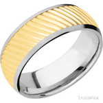 8 mm wide/Domed/14K White Gold band with one 6 mm Centered inlay of 14K Yellow Gold with a machined Ripple pattern.
