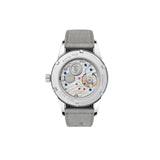 Watch with a gray strap and visible mechanical components on a white background