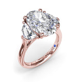 Three Stone Oval and Cadillac Engagement Ring