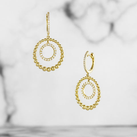 Gold and diamond beaded circular drop earrings