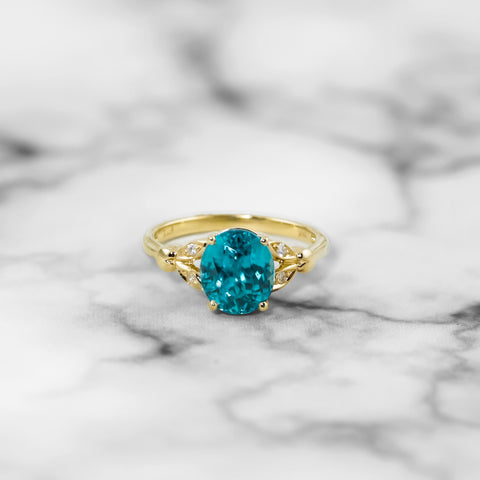 Yellow Gold Oval Blue Zircon Leaf Ring with Diamonds